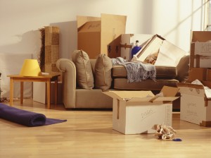 Unpacked moving boxes in Living Room