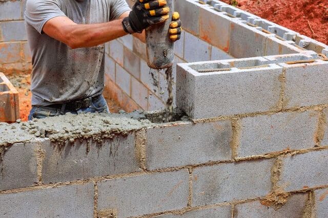 dosage enduit ciment chaux sur parpaing